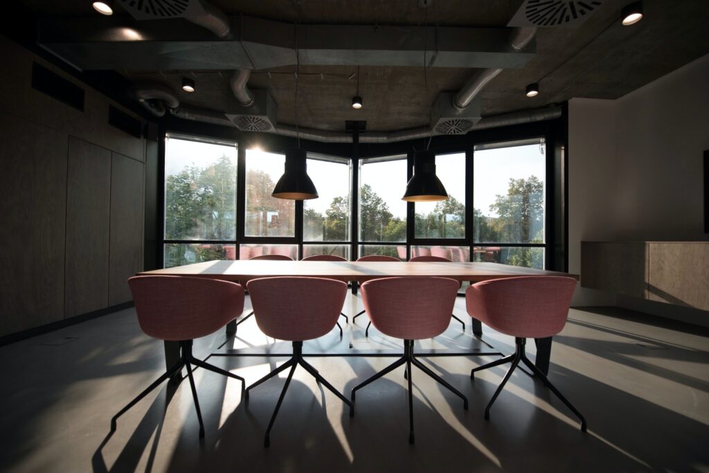 Office meeting room space with table and chairs